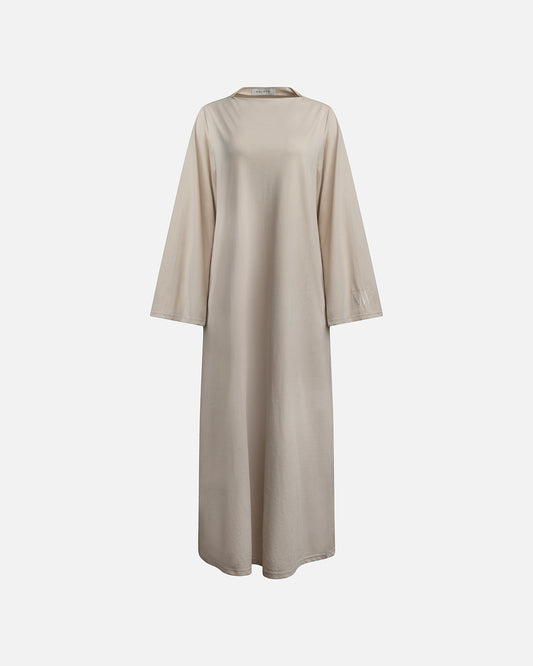 Eco-friendly abaya dress made of Sorona bio-cotton, lightweight and breathable material in color beige, displayed on a neutral background